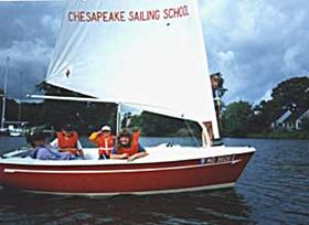 youth sailing with kids on boats